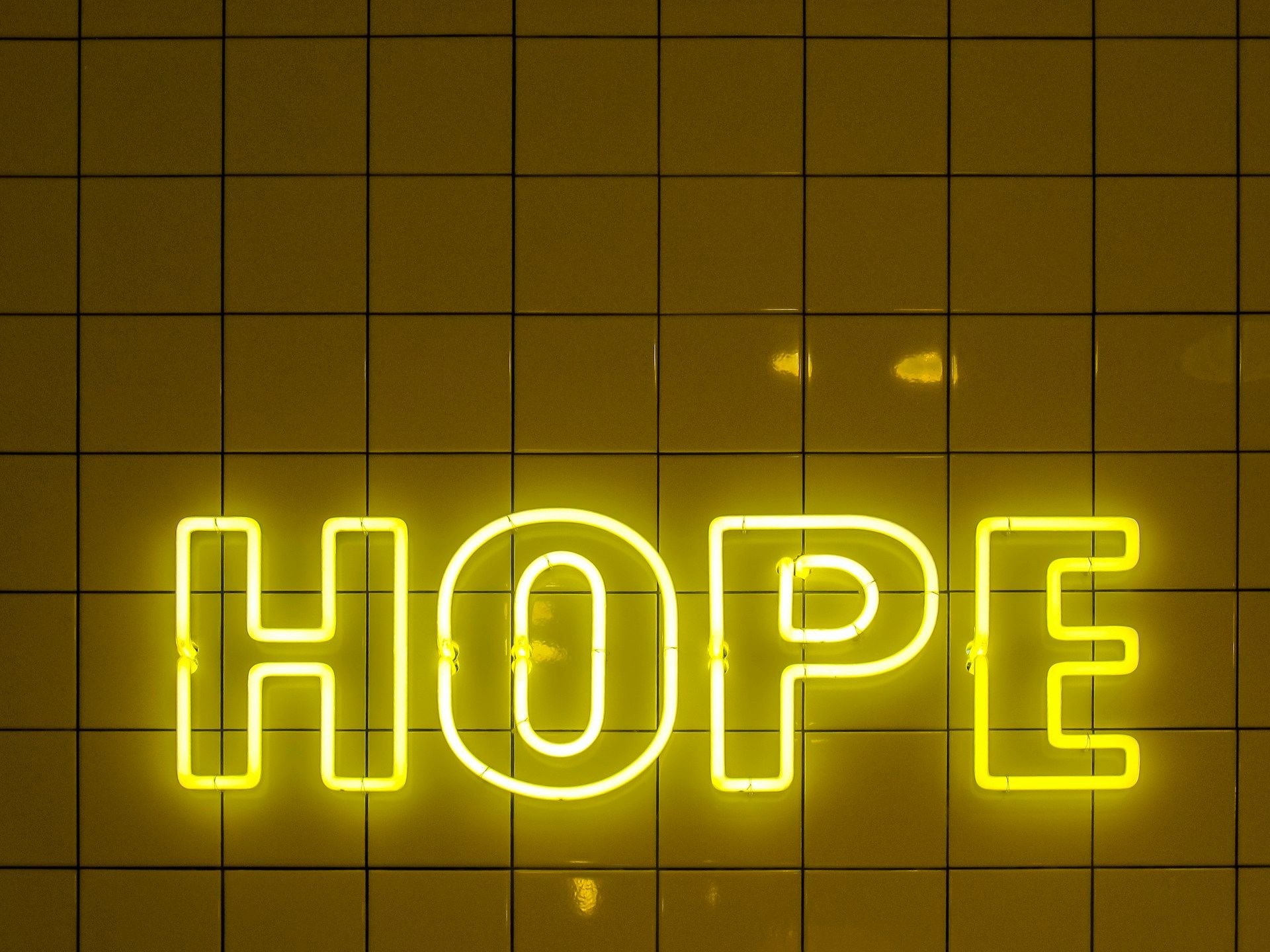 'Hope' in enlighten letters on the wall
